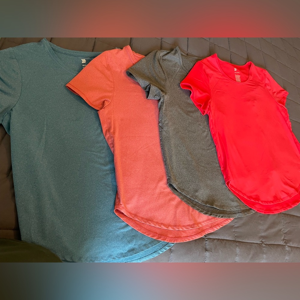 NWOT. All in motion set of 4 shirts